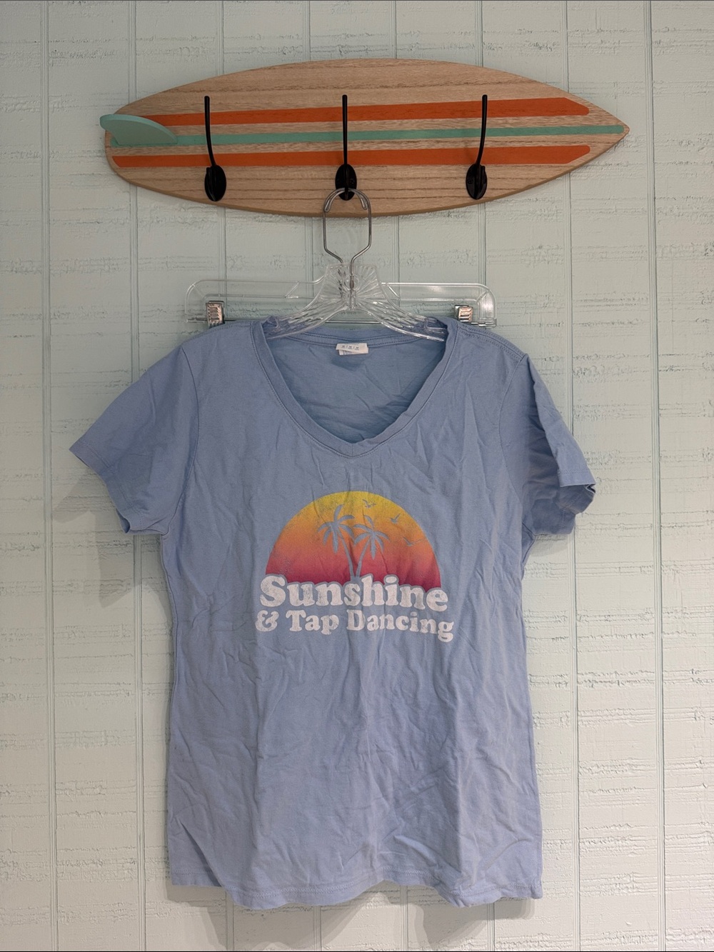 Light Blue V-Neck Tee with Sunshine and Tap Dancing Graphic